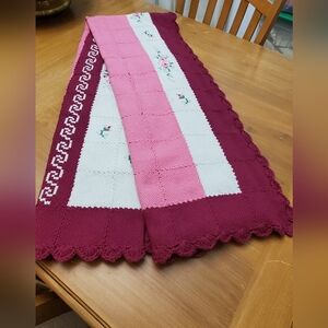 Crochet blanket,  48 x 72. Cranberry,  cream and pink background with decorative